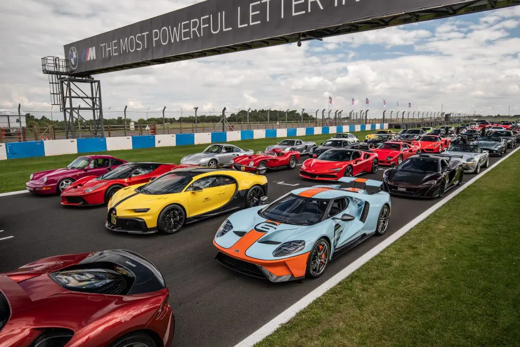 A line-up of supercars at a driving event
